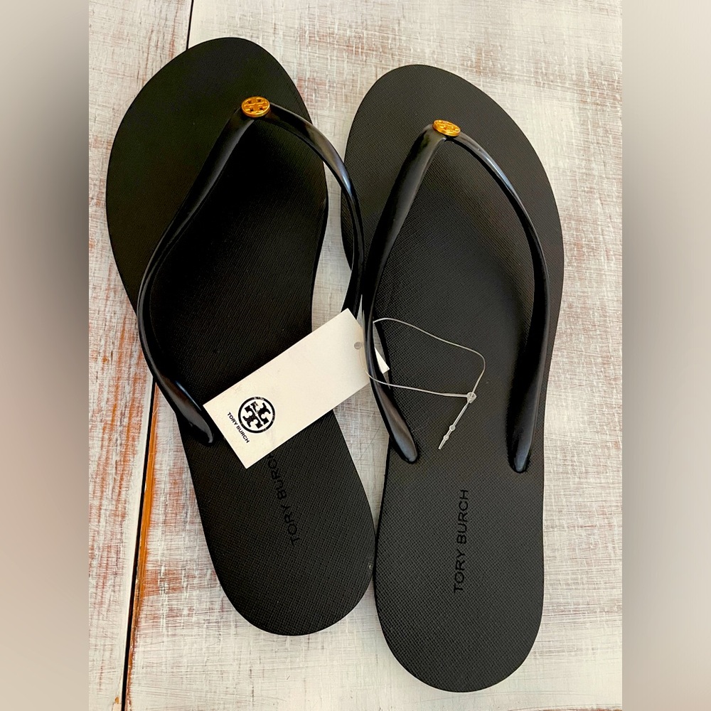 Tory Burch two tone black flip flops with gold embellishment.:size 11 Black
